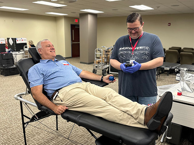 Photo of community participants giving blood during the drive.